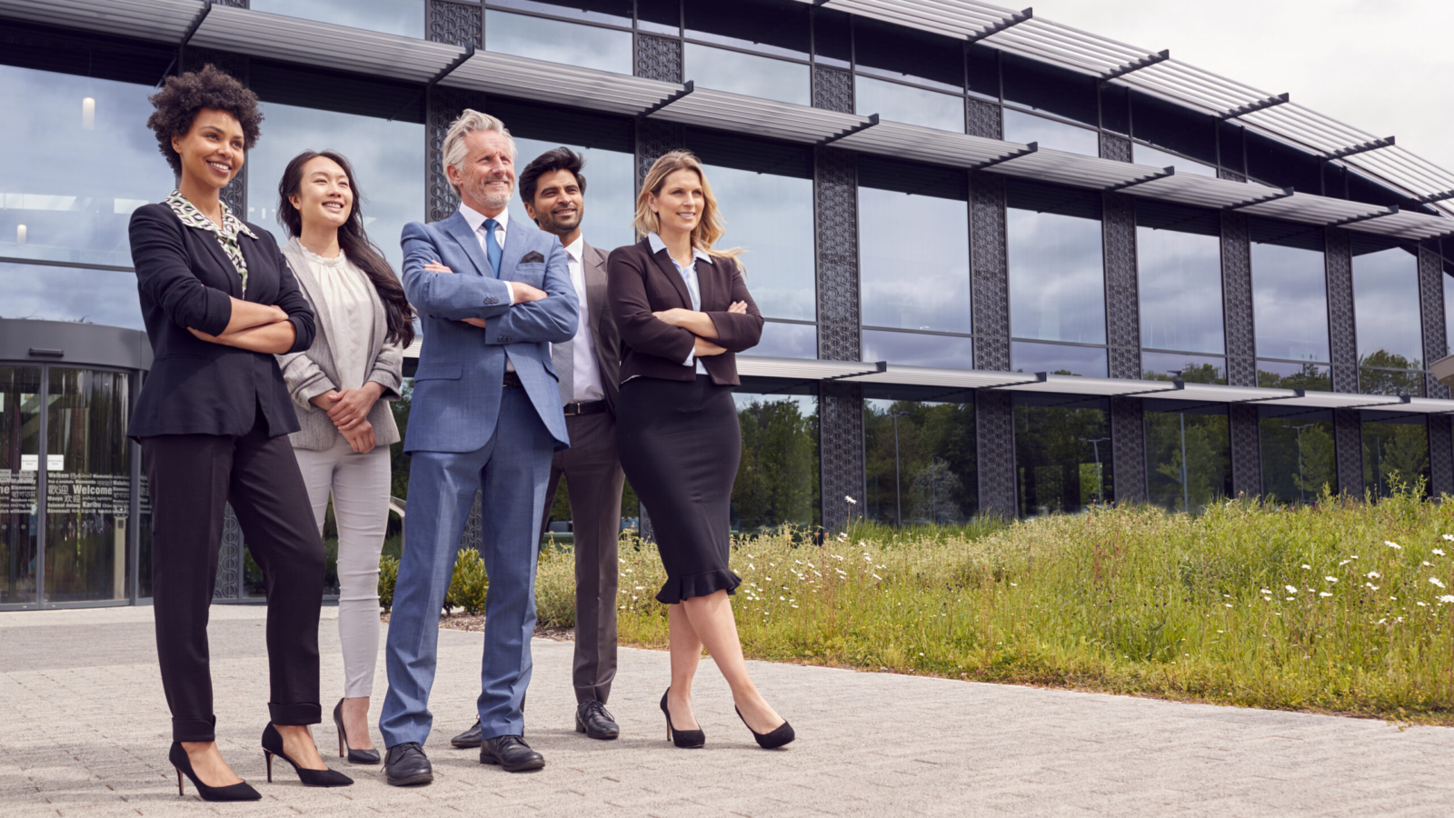 Portrait Of Multi-Cultural Business Team Outside Modern Office Building